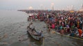 Hindu devotees come to confluence of the Ganges River for holy dip during the festival Kumbh Mela Royalty Free Stock Photo