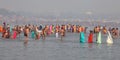 Hindu devotees come to confluence of the Ganges River for holy dip during the festival Kumbh Mela Royalty Free Stock Photo