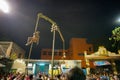 Hindu devotees hanging in air, religious festival