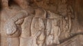 Hindu god in the form of a rock-cut cyanobacterium. The rock is located in the background