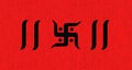Hindu god ganesh ji symbol Swastik over red texture background