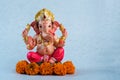 Hindu God Ganesha. Ganesha Idol on blue background