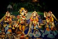 Hindu God Krishna with his wife Radha and Gopikas