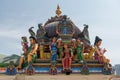 Hindu god statue by roof at Sri Mariamman Temple, Singapore