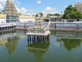 Hindu God Temple with a pond filled with water in the center Royalty Free Stock Photo