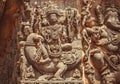 Hindu god of war, Murugan, on facade of Indian temple with friezes narrating legends from Hindu texts. Halebidu, India