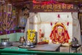 hindu goddess statue decorated with flowers at temple from flat angle Royalty Free Stock Photo