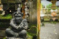 Hindu idol of the deity stone statue sitting at the entrance of the house.