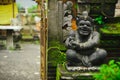 Hindu idol of the deity stone statue sitting at the entrance of the house.