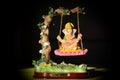`Hinduism` Hindu God-Ganesha in art form sitting on a swing.