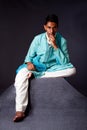 Hindu man sitting and thinking Royalty Free Stock Photo