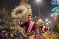 Hindu men at the religious Ganga Aarti ritual, fire puja in Varanasi, India