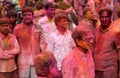Hindu men and women celebrating Holi festival
