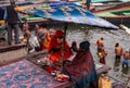 A Hindu Monk sitting on the bank of Ganges river in Varanasi Ghat during Kumbha mela. Benaras Utrar Pradesh India 01/05/2024 Royalty Free Stock Photo