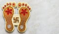 Hindu mythological Goddess Laxmi's footprint with stylish text of Diwali for Diwali celebration