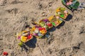 Hindu offerings and gifts to god on the beach in Bali, Indonesia Royalty Free Stock Photo