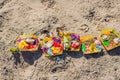 Hindu offerings and gifts to god on the beach in Bali, Indonesia Royalty Free Stock Photo