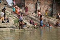 Hindu people bathing in the ghat near the Dakshineswar Kali Temple in Kolkata