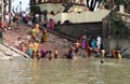 Hindu people bathing in the ghat near the Dakshineswar Kali Temple in Kolkata Royalty Free Stock Photo