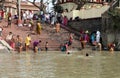 Hindu people bathing in the ghat near the Dakshineswar Kali Temple in Kolkata Royalty Free Stock Photo