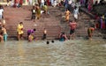 Hindu people bathing in the ghat near the Dakshineswar Kali Temple in Kolkata Royalty Free Stock Photo