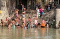 Hindu people bathing in the ghat near the Dakshineswar Kali Temple in Kolkata Royalty Free Stock Photo