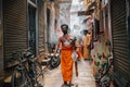 Hindu perform worship ceremony at Bangali Tola old street in Varanasi, India Royalty Free Stock Photo