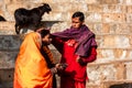 Hindu pilgrims blessed by a priest at the ancient Kamakhya temple complex in the city of