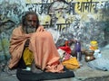 Hindu piligrim sadhu in orange clothes on the streets in India