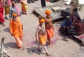 Hindu piligrims in orange clothes in Varanasi