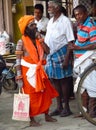 Hindu piligrims in orange clothes in Varanasi