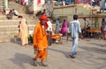 Hindu piligrims in orange clothes in Varanasi