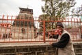 A Hindu priest outside an ancient temple