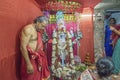 Hindu priest worshipping Goddess Kali