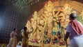 Hindu Purohits worshipping Goddess Durga with puja ingredients