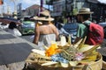 Hindu religion offering against tourist traffic in Ubud Bali Indonesia