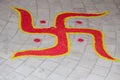 A Hindu religion Swastik sign red rangoli