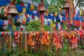 Hindu religious threads with wishes of devotees and Buddhist religious flags at Mahakal Temple Royalty Free Stock Photo