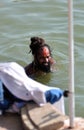 Hindu Sadhu Bathing in Ganges Royalty Free Stock Photo