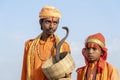 Hindu sadhu holy men and snake cobra in Pushkar, India, close up portrait Royalty Free Stock Photo