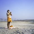 Varanasi, India Hindu Sadhu in yoga pose