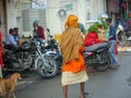 Hindu religion saint, monk or Sadhu. Indian Holy man roaming in street market of rural village