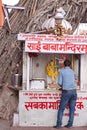 Hindu Shrine and Devotee Royalty Free Stock Photo