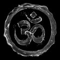 Hindu sign Om made of water splashes on black background