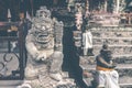 Hindu stone statue in the balinese temple. Tropical island of Bali, Indonesia. Royalty Free Stock Photo