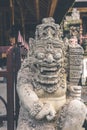 Hindu stone statue in the balinese temple. Tropical island of Bali, Indonesia. Royalty Free Stock Photo