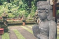 Hindu stone statue in the balinese temple. Tropical island of Bali, Indonesia. Royalty Free Stock Photo