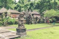 Hindu stone statue in the balinese temple. Tropical island of Bali, Indonesia. Royalty Free Stock Photo