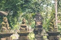 Hindu stone statue in the balinese temple. Tropical island of Bali, Indonesia. Royalty Free Stock Photo