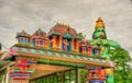 Hindu temple and the statue of Hanuman at Ramayana Cave, Batu Caves, Kuala Lumpur Royalty Free Stock Photo